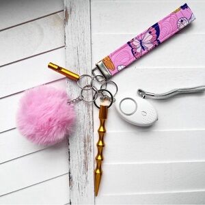 Pink Butterfly Wristlet Keychain with Pom Pom and Gold Self-Defense Tool